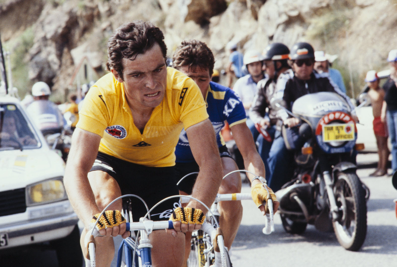Bernard Hinault climbing aggressively in Tour de France action
