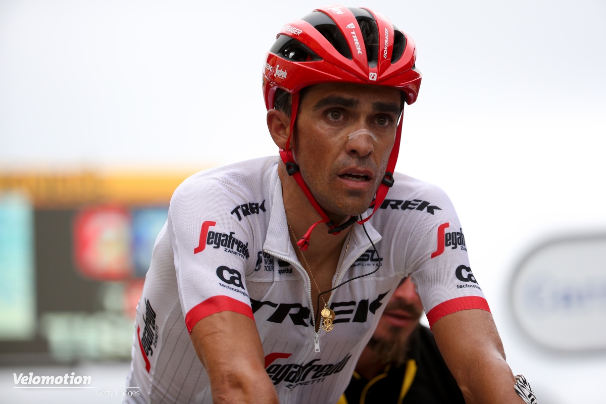 Medical team attending to Alberto Contador on the roadside after a fall