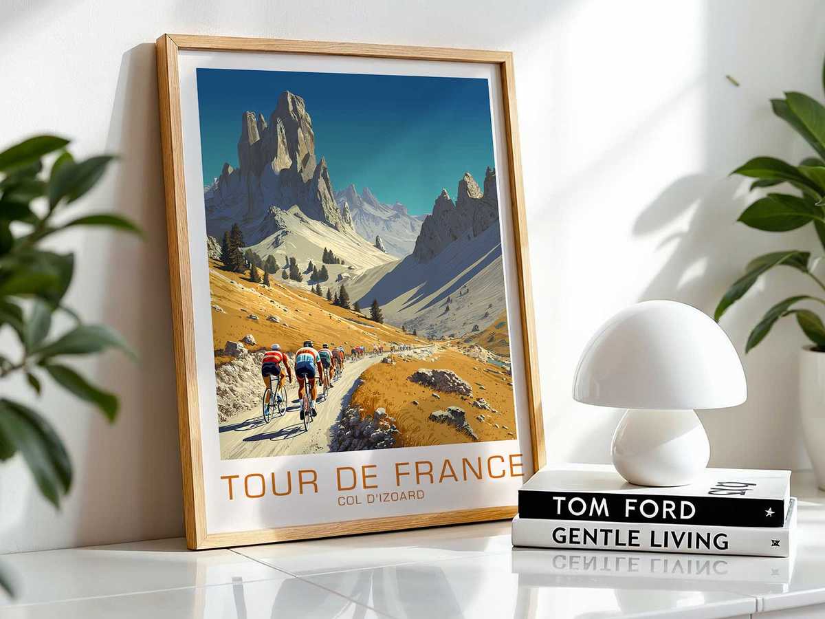 Wide-format poster framing the Izoard pass like a film still, riders small against dramatic light and rugged peaks