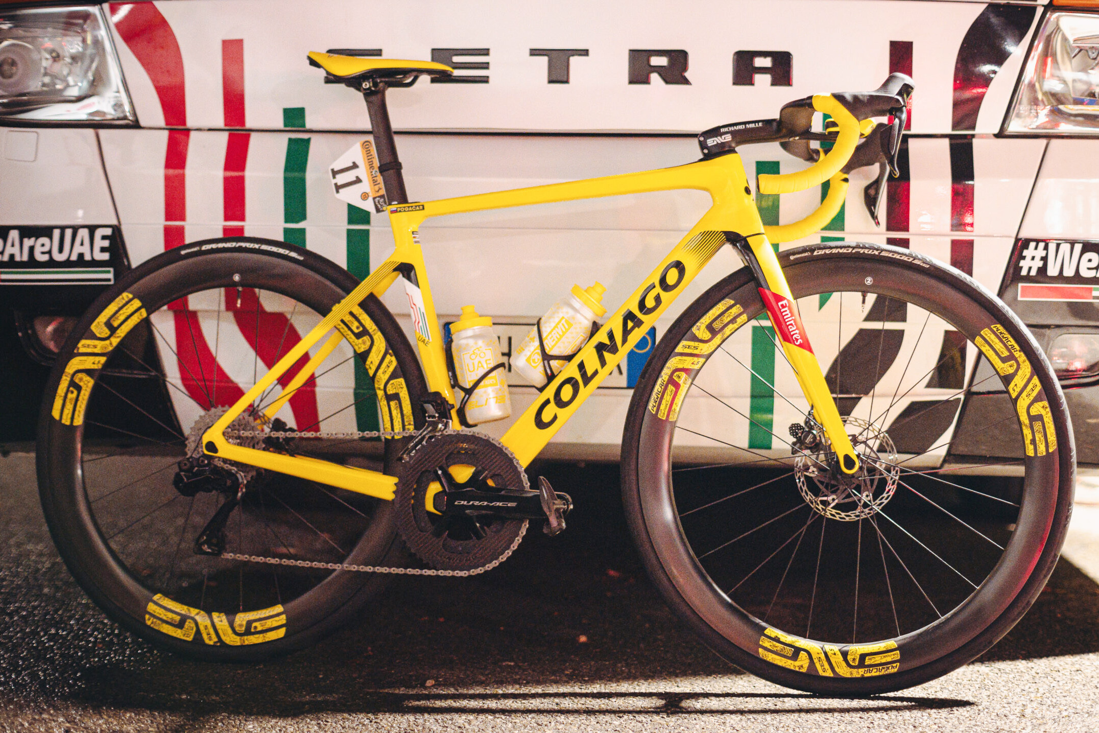 Vintage steel road bike ridden in a past Tour de France with slender tubing and downtube shifters