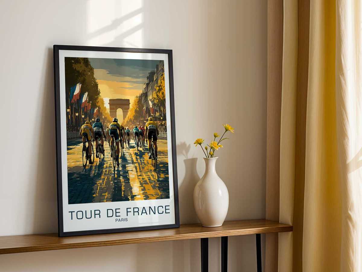 Spectators leaning forward as cyclists flash by, hands and flags creating foreground energy against the racing blur