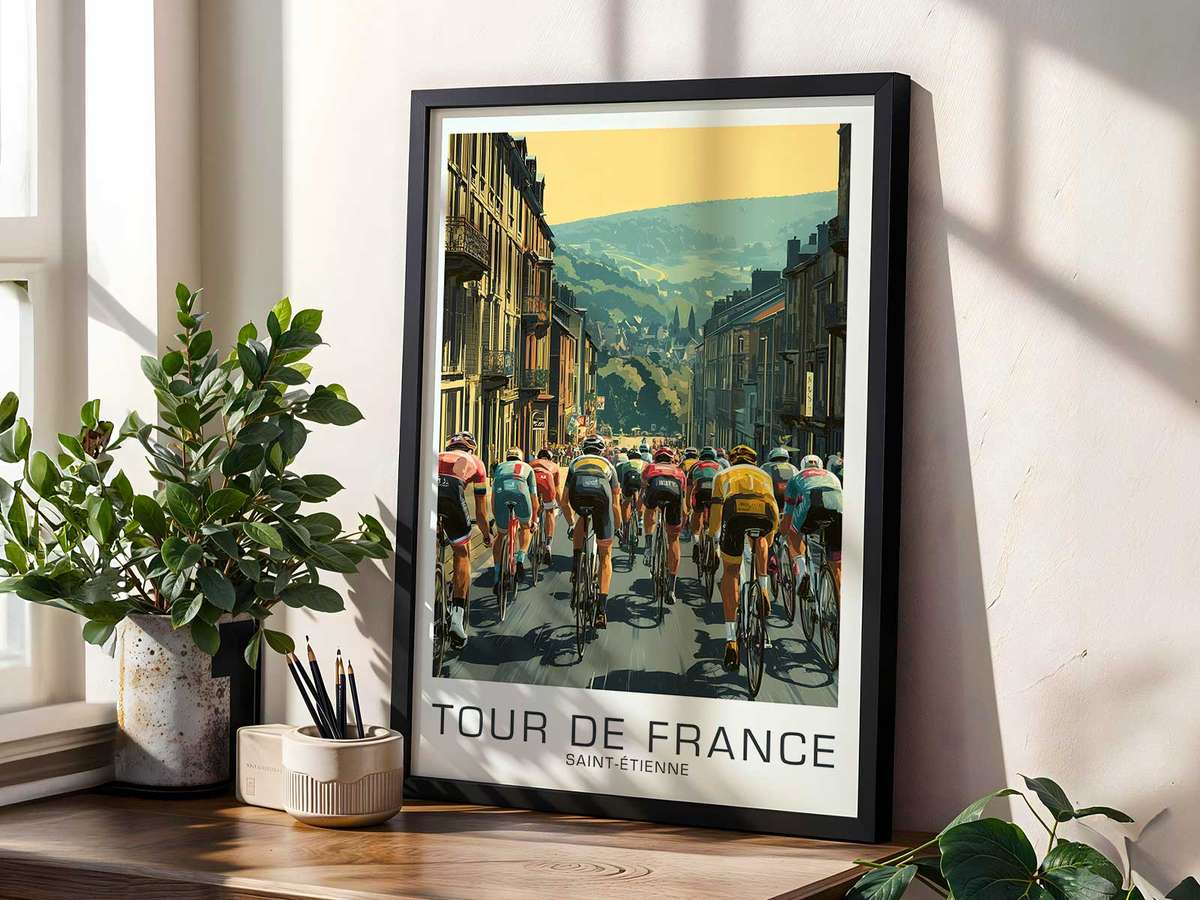 Framed Saint-Étienne cycling poster displayed on a living room wall as stylish wall art