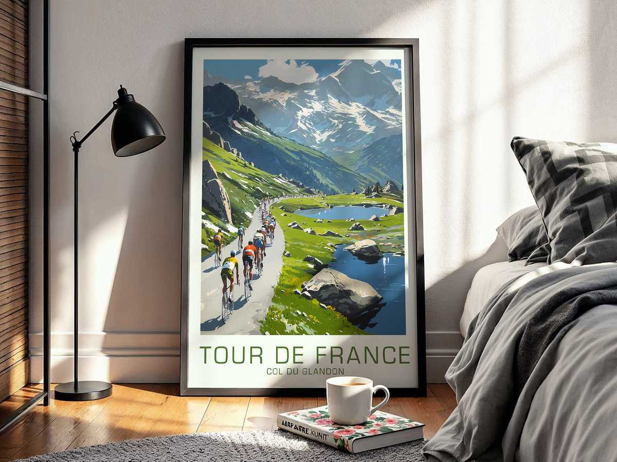 Wide panoramic composition of the Col du Glandon climb with a peloton shrinking into the mountain curves