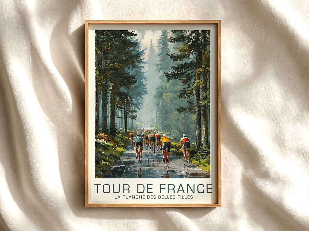 Close-up of a cyclist on La Planche des Belles Filles showing focused expression and tense shoulders while gripping the…