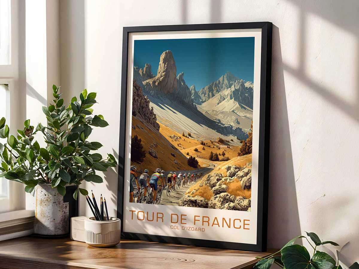 Minimalist portrait of a rider framed by negative space and the stark profile of Col d'Izoard, evoking concentration and…