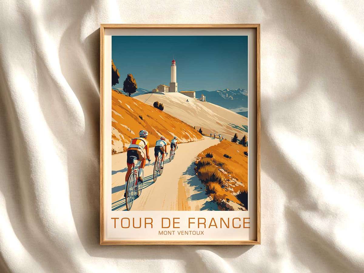 Close-up of a cyclist climbing Mont Ventoux, head low and hands on drops showing focused effort